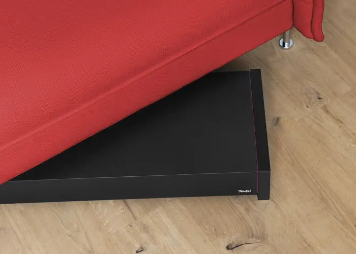 T 4000 FLachsubwoofer unter Sofa